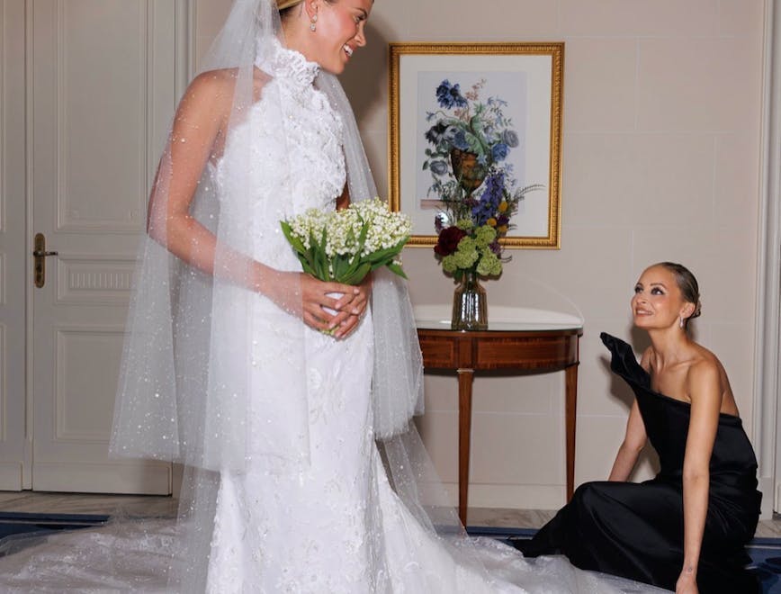 dress formal wear fashion gown wedding gown flower flower arrangement flower bouquet bride person